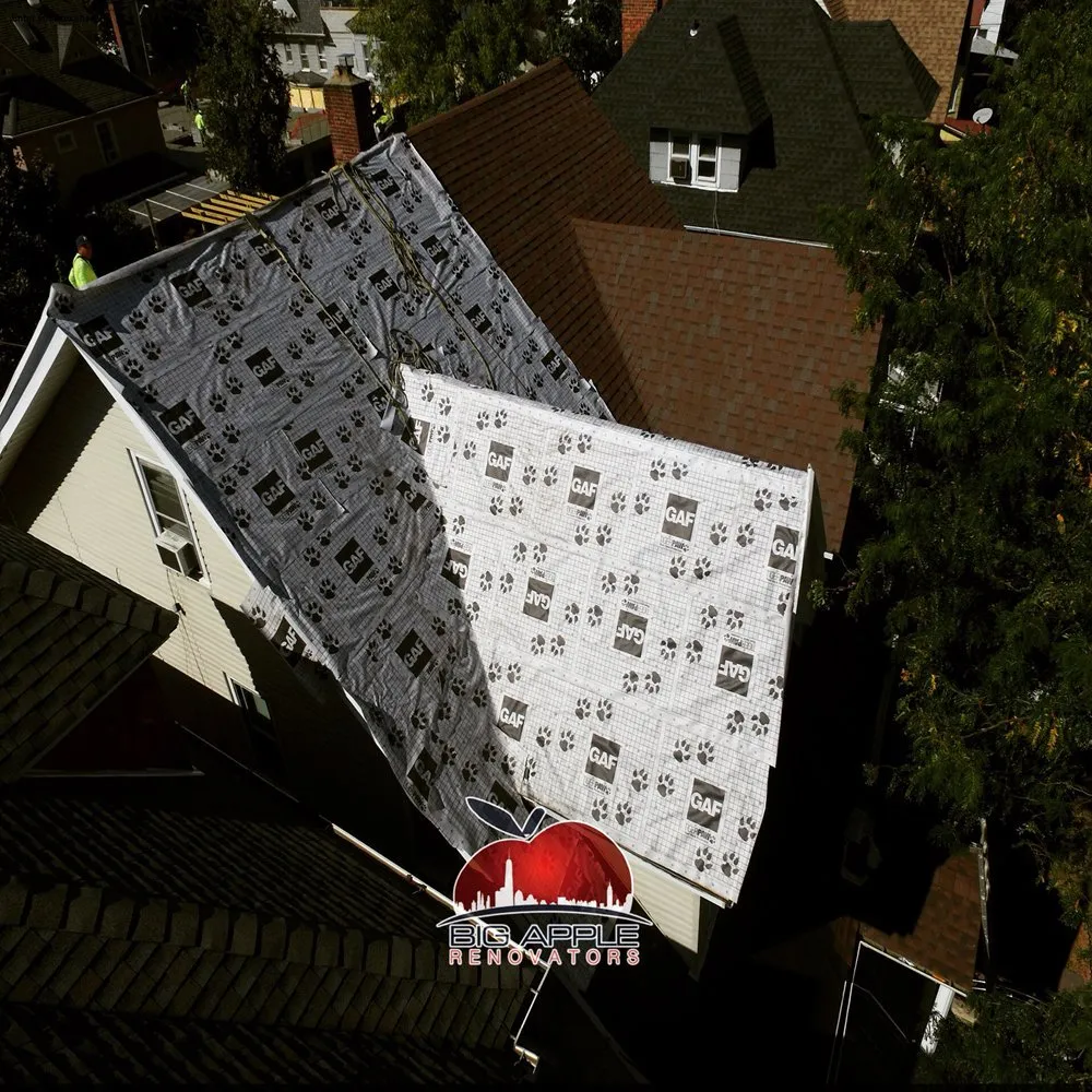 Slide of Big Apple Renovators - Queens