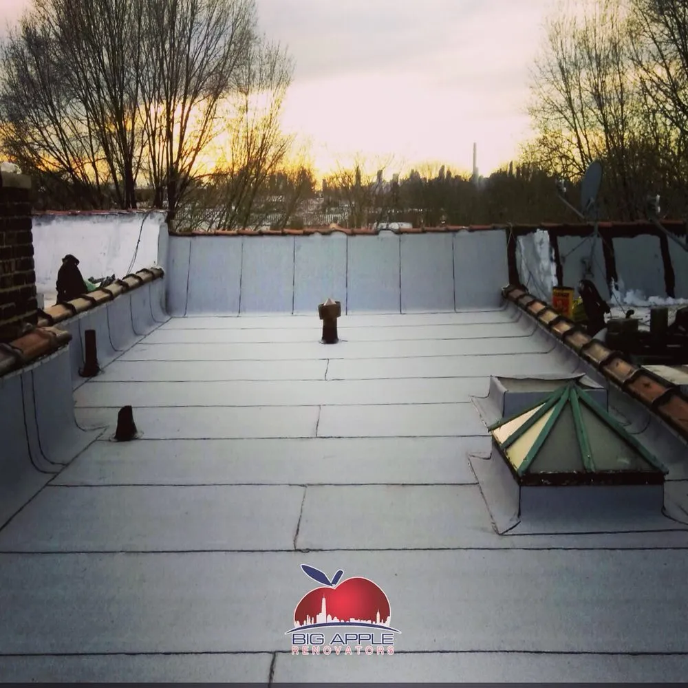 Slide of Big Apple Renovators - Queens