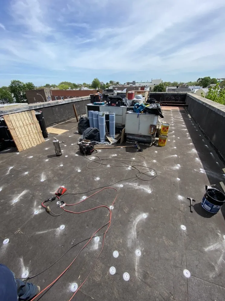 Slide of Big Apple Renovators - Queens