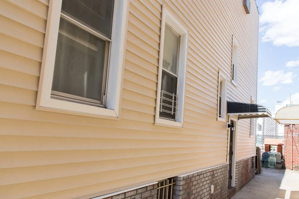 Slide of Big Apple Renovators - Queens