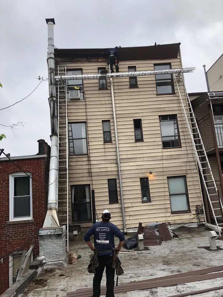 Slide of Big Apple Renovators - Queens