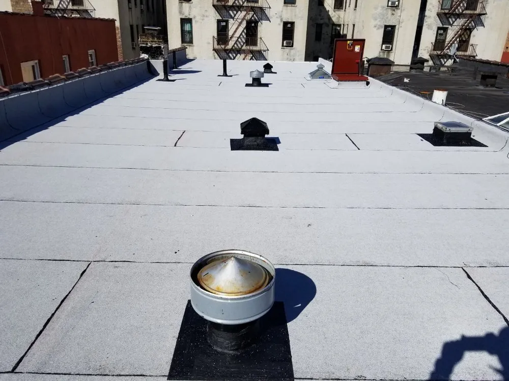 Slide of Big Apple Renovators - Queens