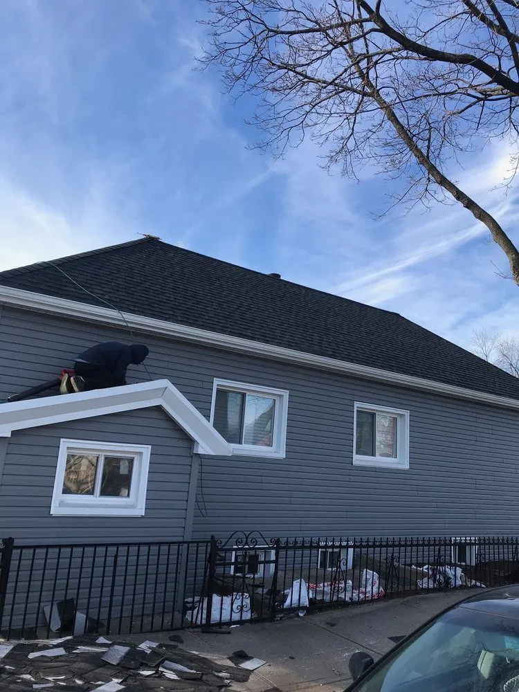 Slide of Big Apple Renovators - Queens