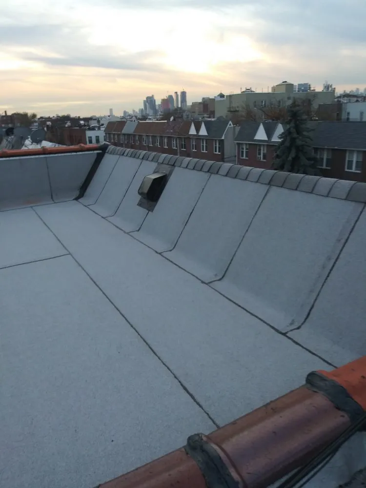 Slide of Big Apple Renovators - Uniondale