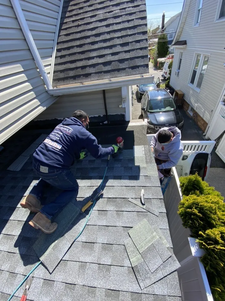 Slide of Big Apple Renovators - Uniondale