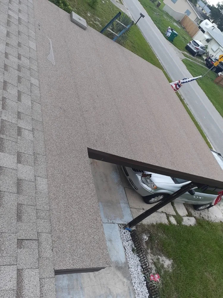 Slide of Big Boys Roofing