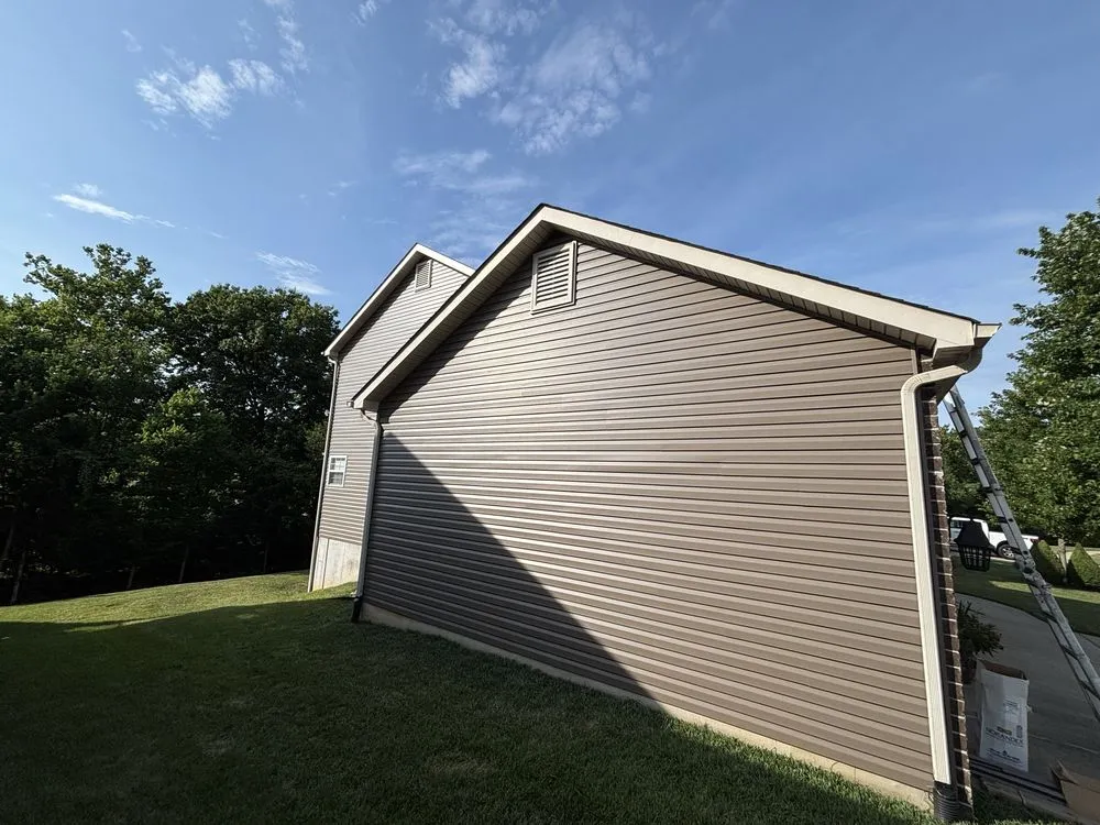 Slide of Big Cat Roofing