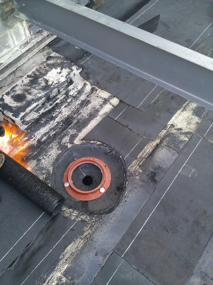 Slide of Big City Roofing