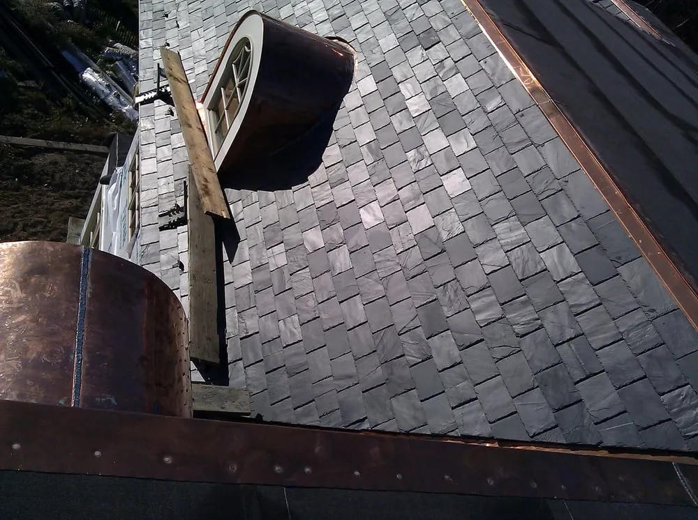 Slide of Big City Roofing