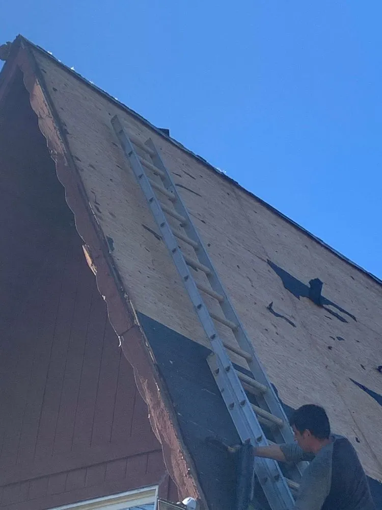 Slide of Big Eagle Roofing Services