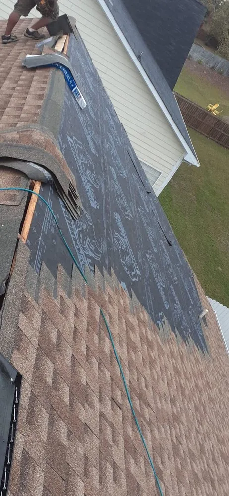 Slide of Big Eagle Roofing Services