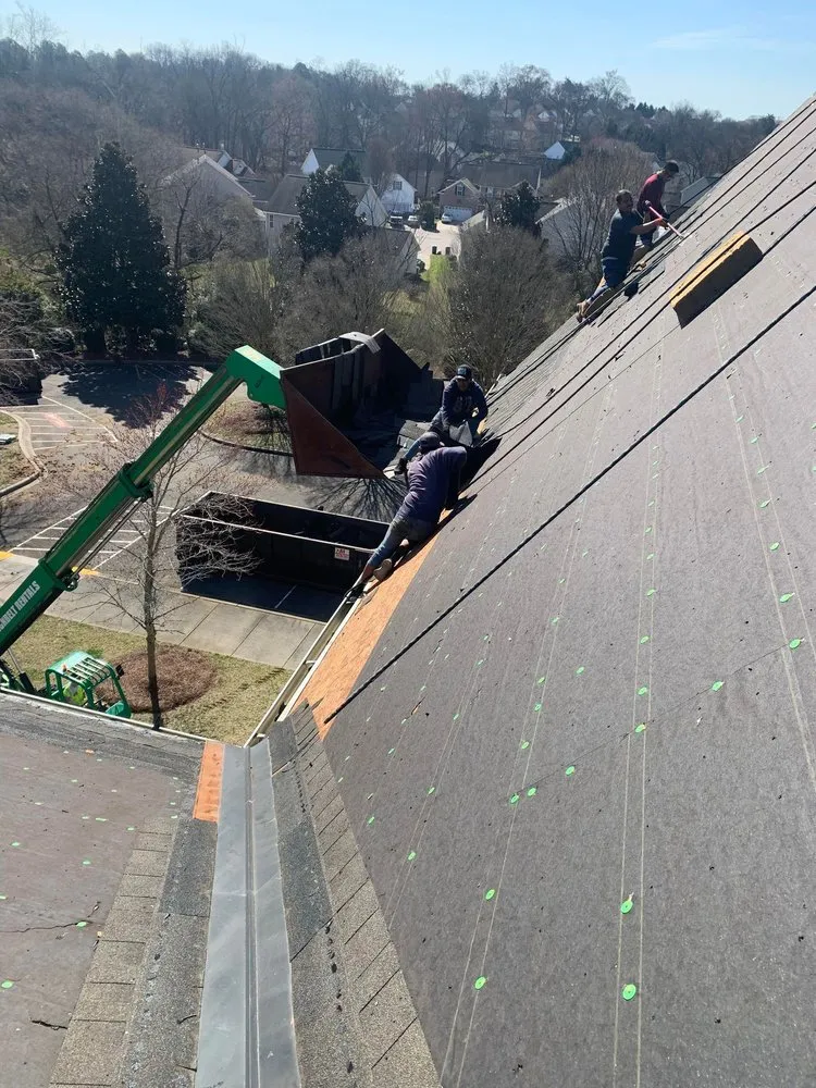 Slide of Big Eagle Roofing Services