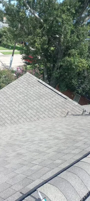 Slide of Big Easy Roofing