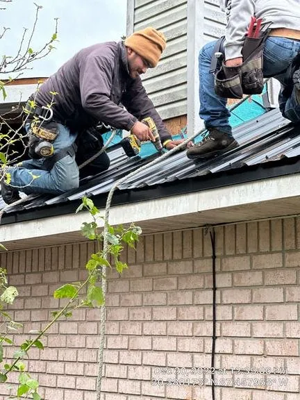 Slide of Big Fish Roofs & Restoration