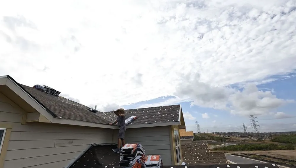 Slide of Big Hat Roofing