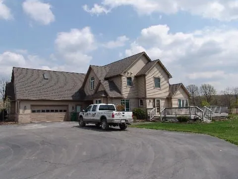 Slide of Big Ikes Roofing