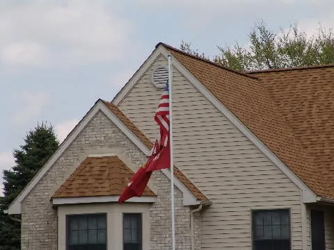 Slide of Big Ike's Roofing