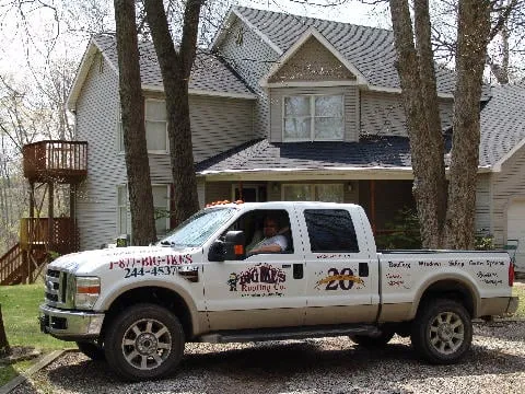 Slide of Big Ike's Roofing