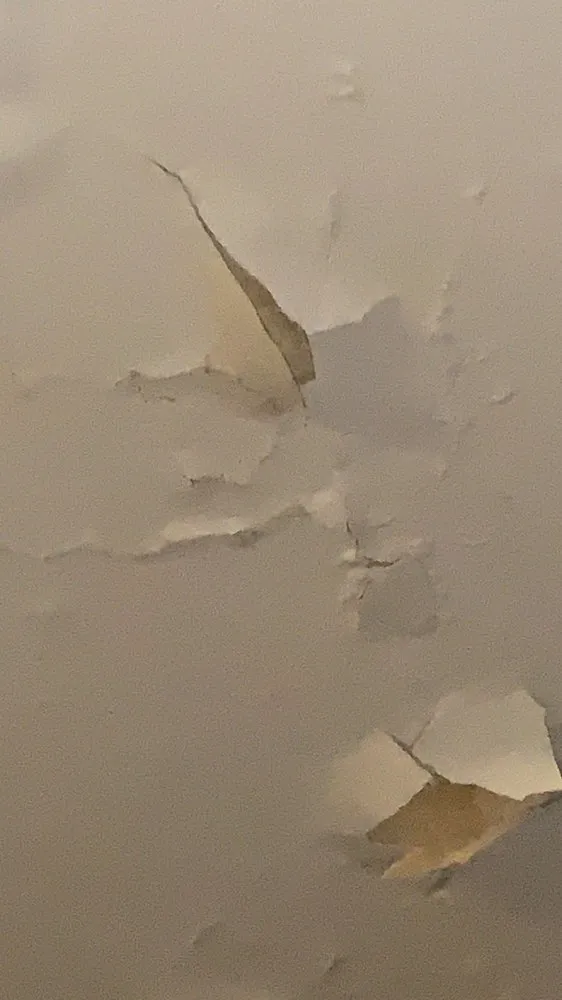 Slide of Big John Roofing