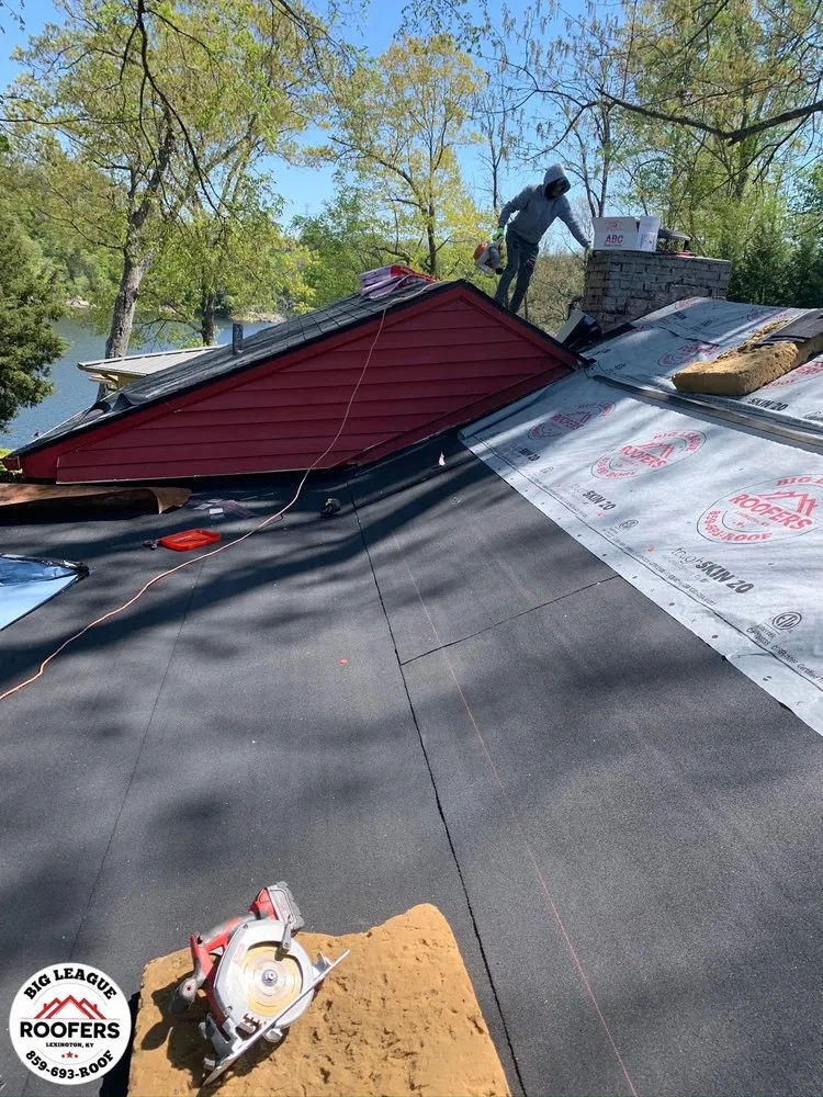 Slide of Big League Roofers