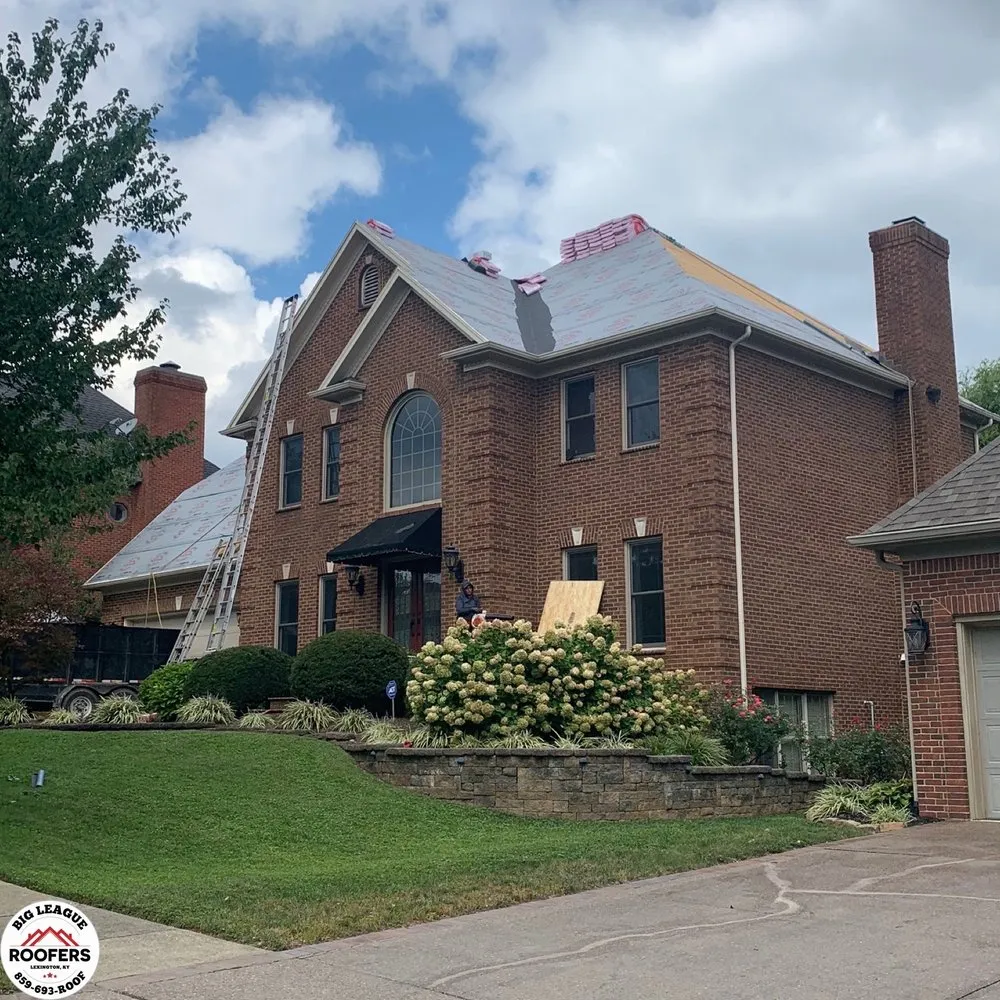 Slide of Big League Roofers