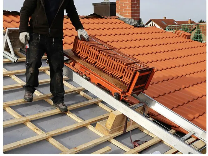 Slide of Big League Roofing