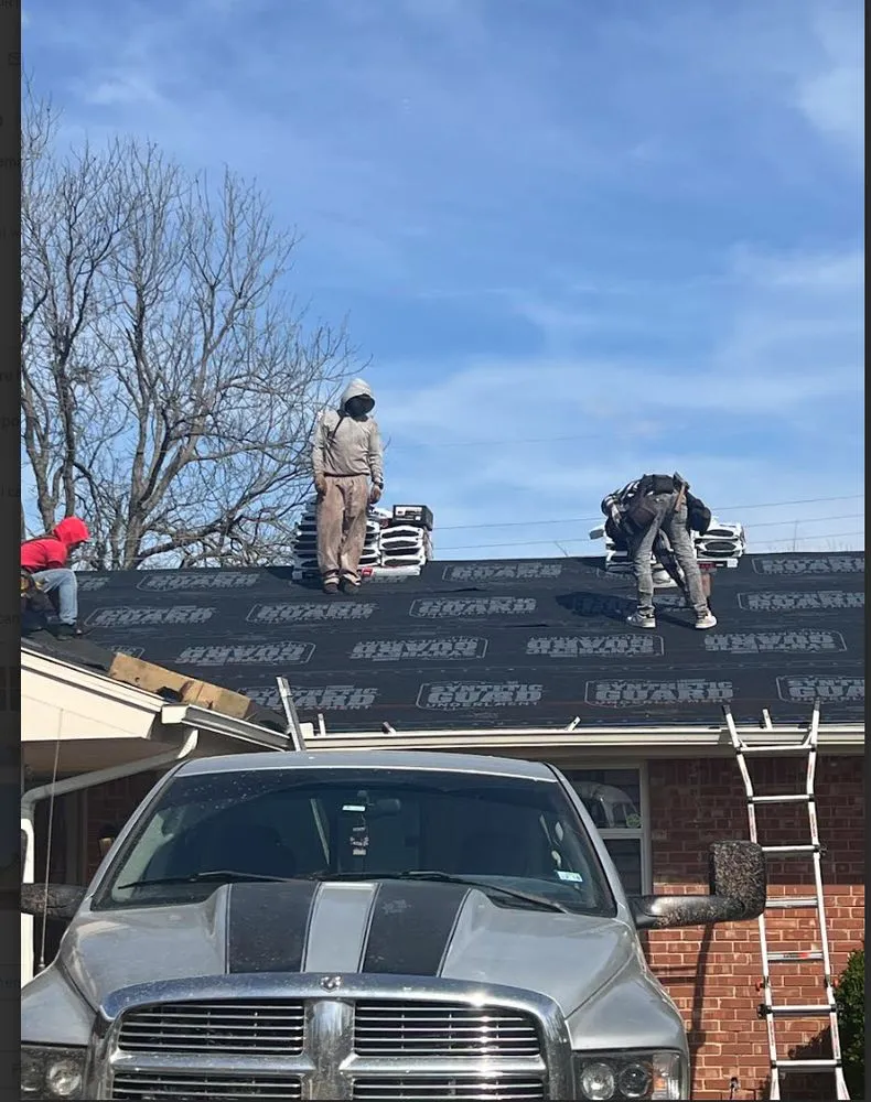 Slide of Big League Roofing