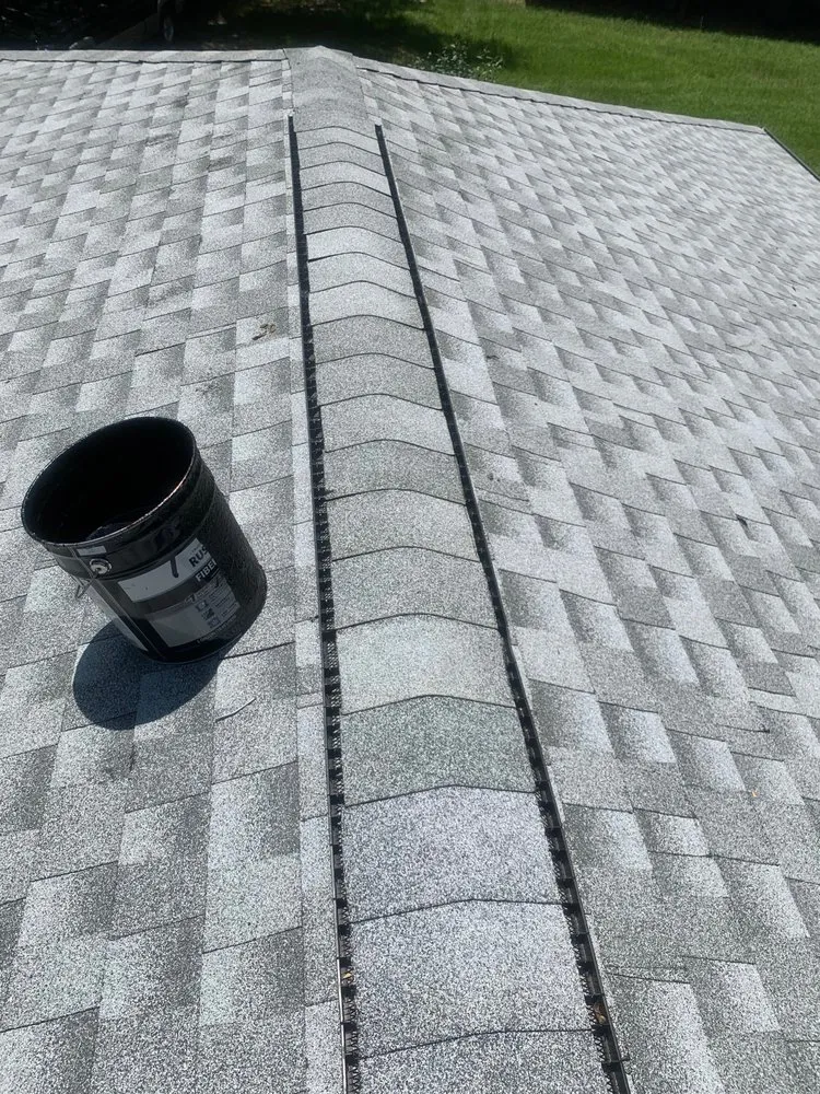 Slide of Big Orange Roofing