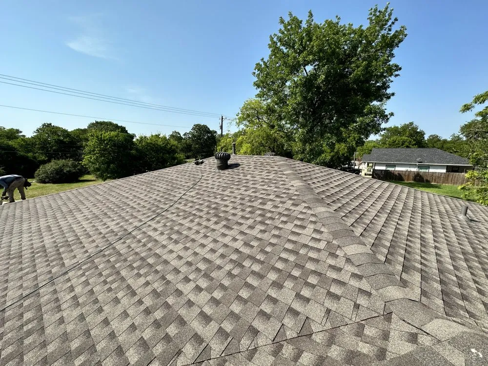 Slide of Big Randys Roofing