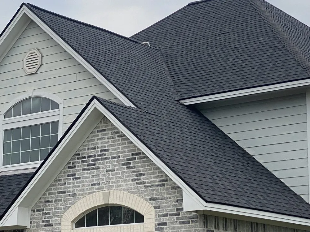 Slide of Big Randys Roofing