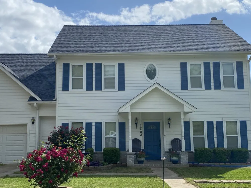 Slide of Big Randys Roofing