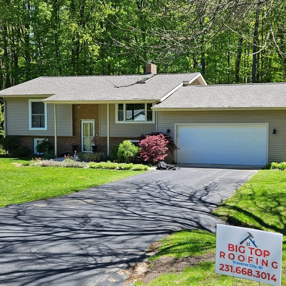 Slide of Big Top Roofing