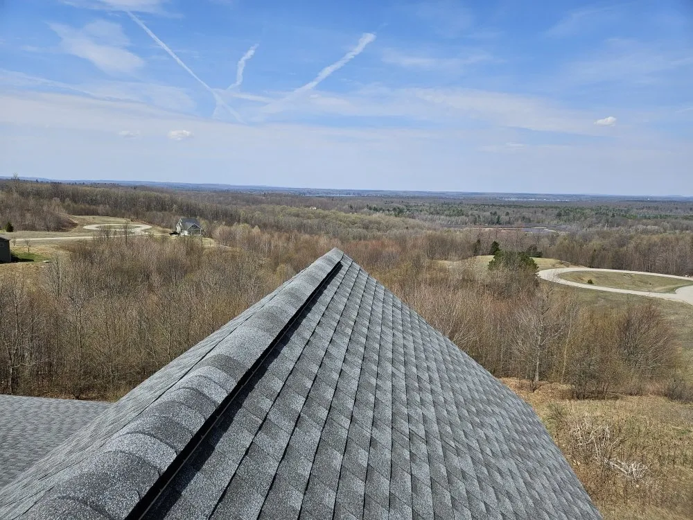 Slide of Big Top Roofing