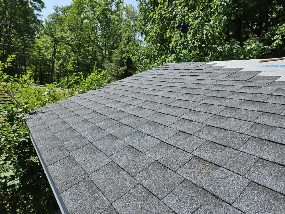 Slide of Big Top Roofing