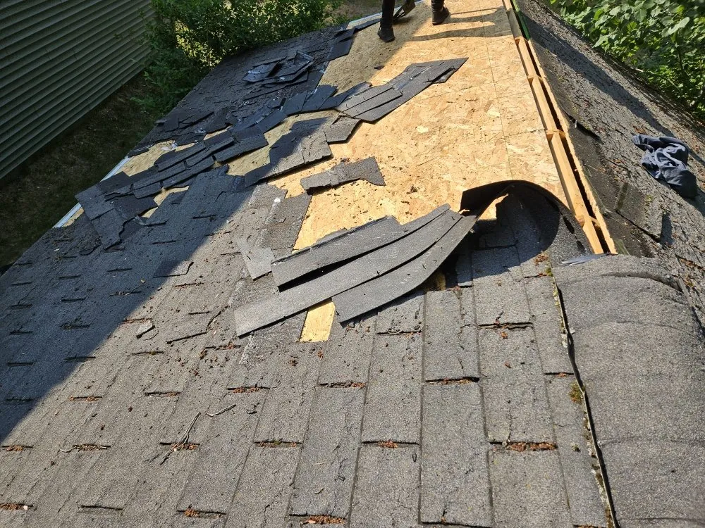 Slide of Big Top Roofing