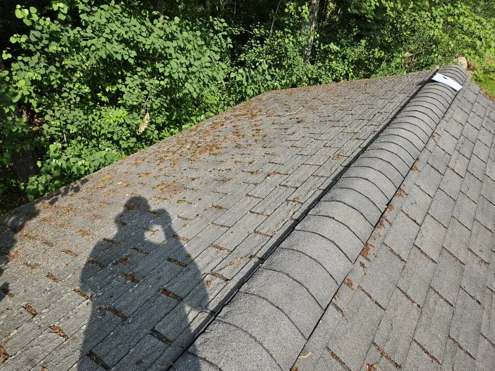 Slide of Big Top Roofing