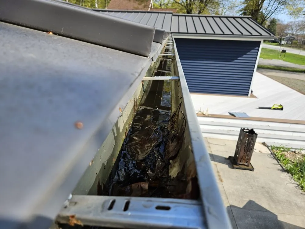 Slide of Big Top Roofing