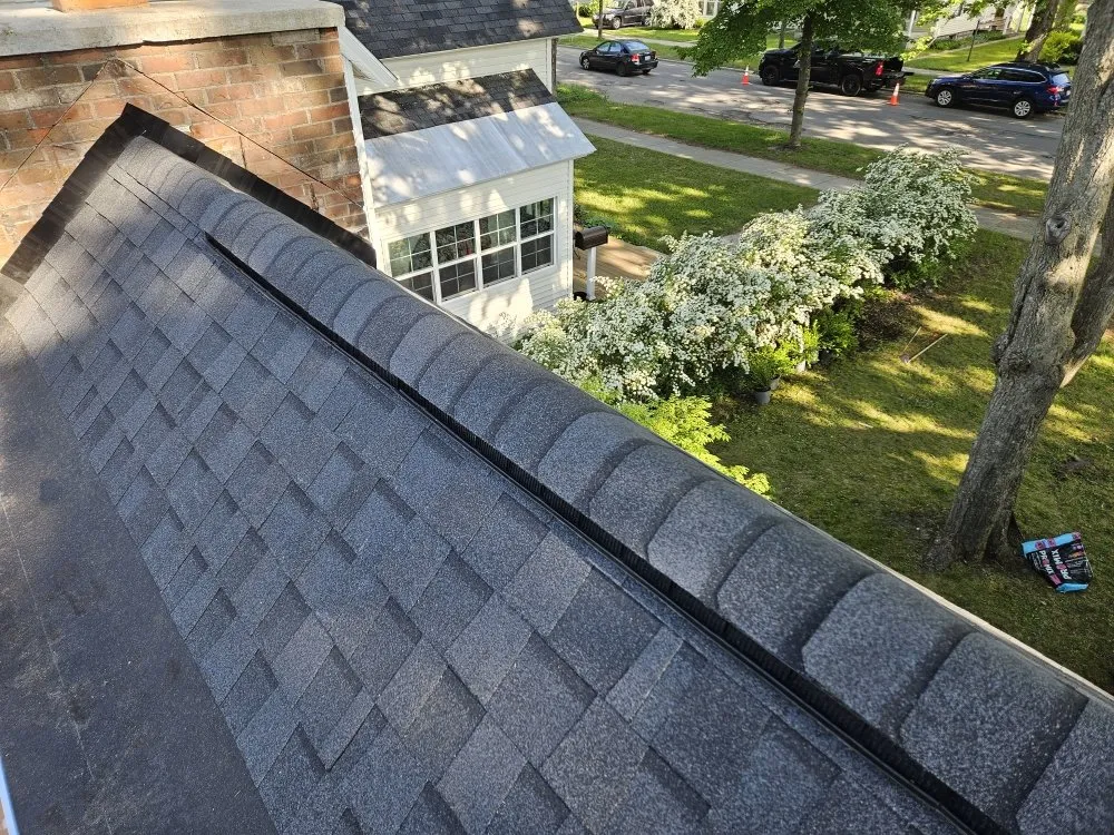 Slide of Big Top Roofing