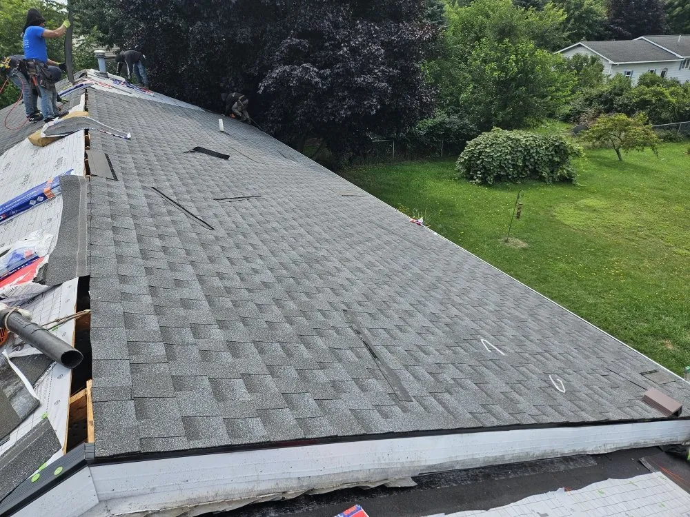 Slide of Big Top Roofing