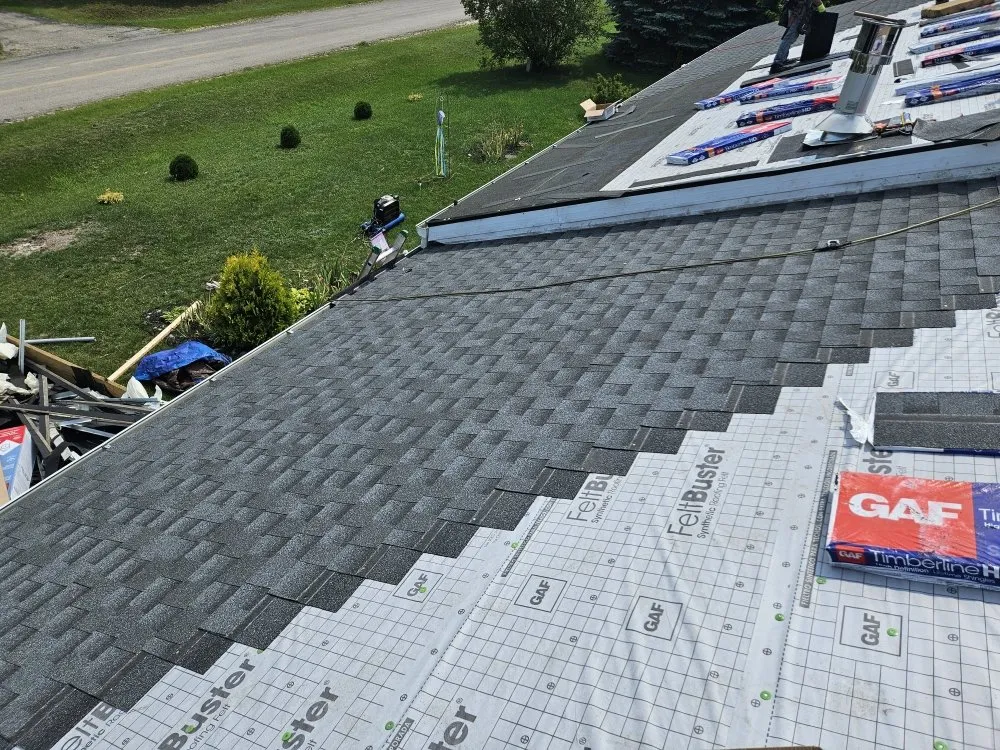 Slide of Big Top Roofing