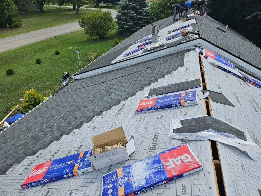 Slide of Big Top Roofing
