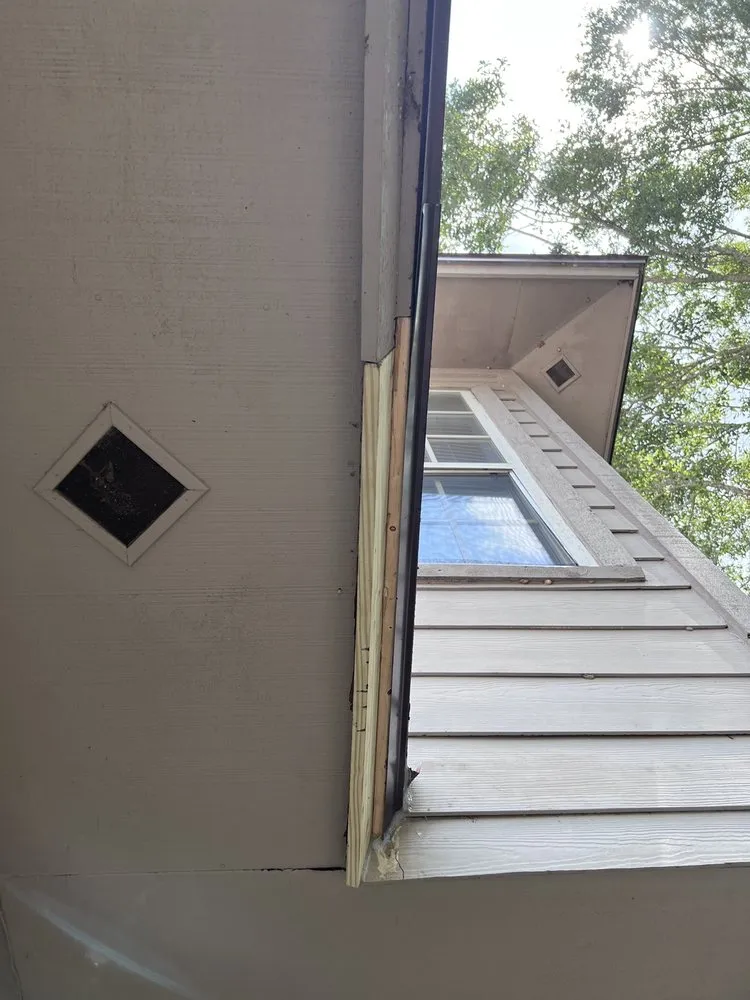 Slide of Big Tuna Roofing