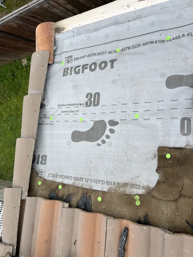 Slide of Bigfoot Roofing