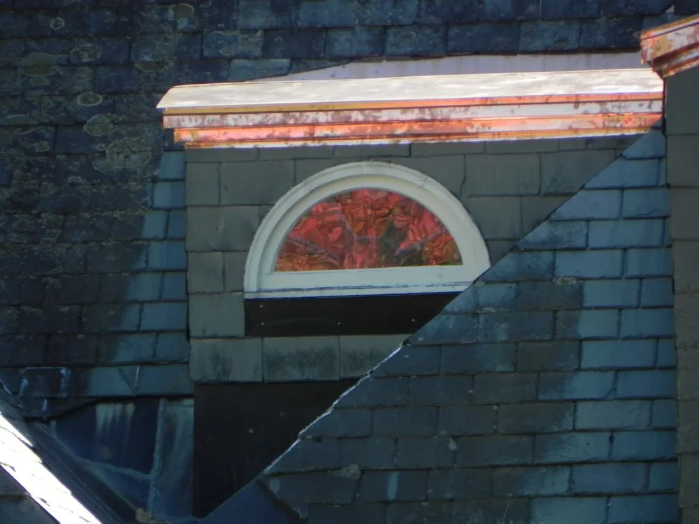 Slide of Bill's Roofing