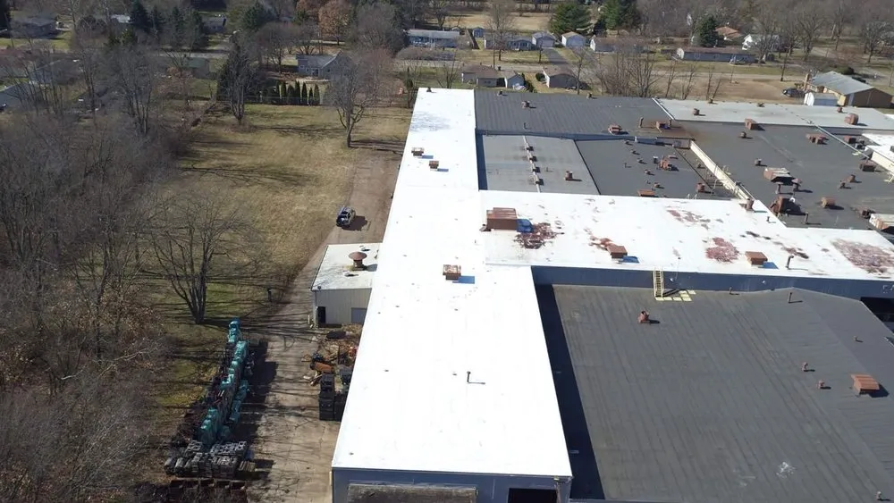 Top-rated flat roof repair in Alden, MI - Billy White Roofing