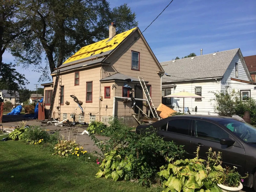 Slide of Billy's Roofing