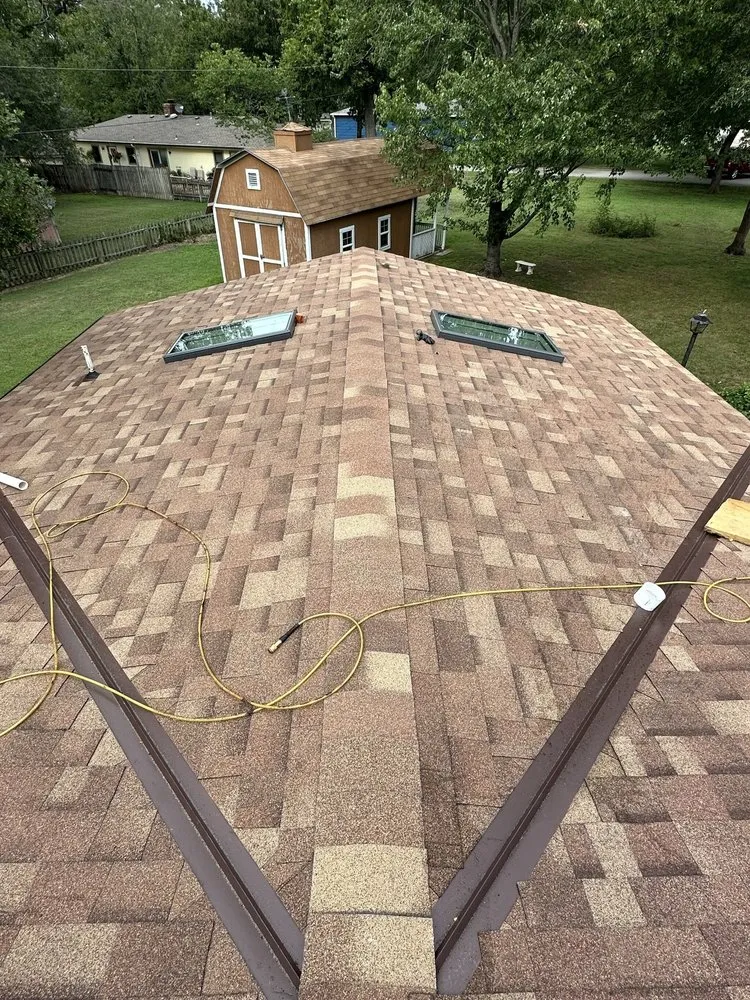 Slide of Bird Dog Roofing and Construction