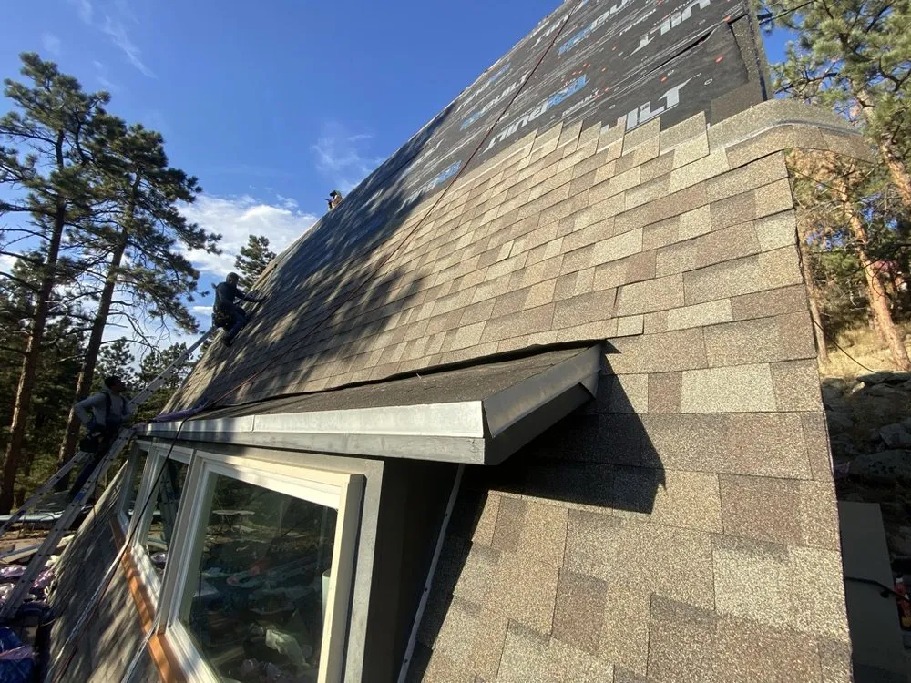 Slide of Birdie Roofing Company