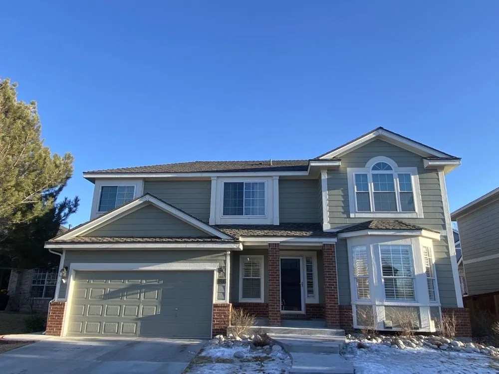 Slide of Birdie Roofing Company