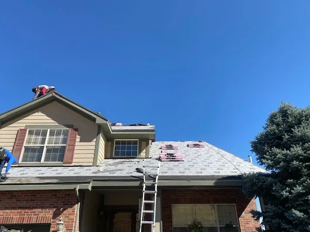 Slide of Birdie Roofing Company